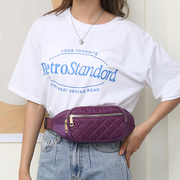 Trendy women’s nylon fanny pack with multiple pockets. Lightweight, durable crossbody waist bag perfect for running, hiking, cycling, and travel.