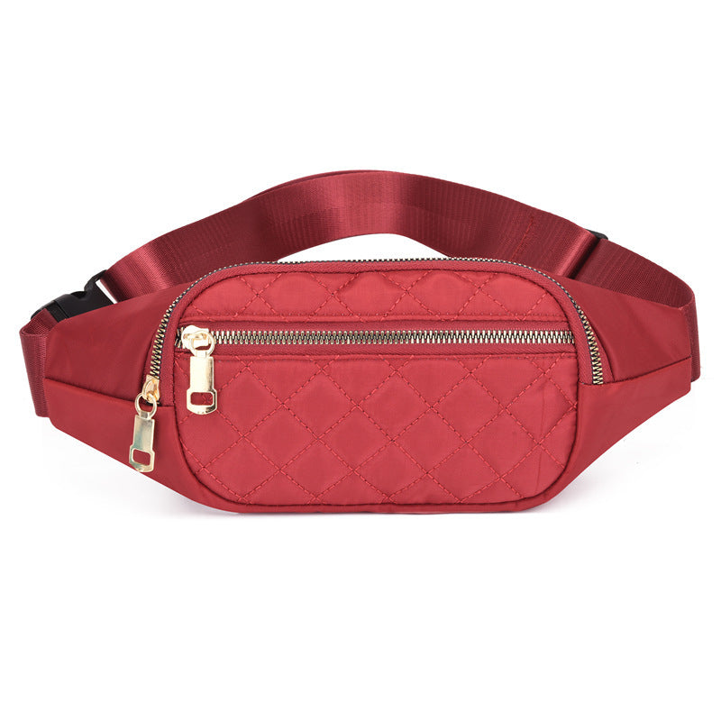 Trendy women’s nylon fanny pack with multiple pockets. Lightweight, durable crossbody waist bag perfect for running, hiking, cycling, and travel.