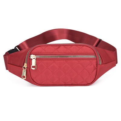 Trendy women’s nylon fanny pack with multiple pockets. Lightweight, durable crossbody waist bag perfect for running, hiking, cycling, and travel.