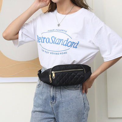 Trendy women’s nylon fanny pack with multiple pockets. Lightweight, durable crossbody waist bag perfect for running, hiking, cycling, and travel.