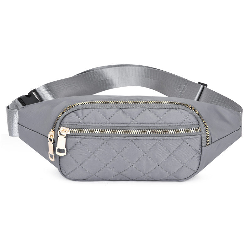 Trendy women’s nylon fanny pack with multiple pockets. Lightweight, durable crossbody waist bag perfect for running, hiking, cycling, and travel.