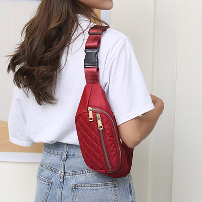 Trendy women’s nylon fanny pack with multiple pockets. Lightweight, durable crossbody waist bag perfect for running, hiking, cycling, and travel.