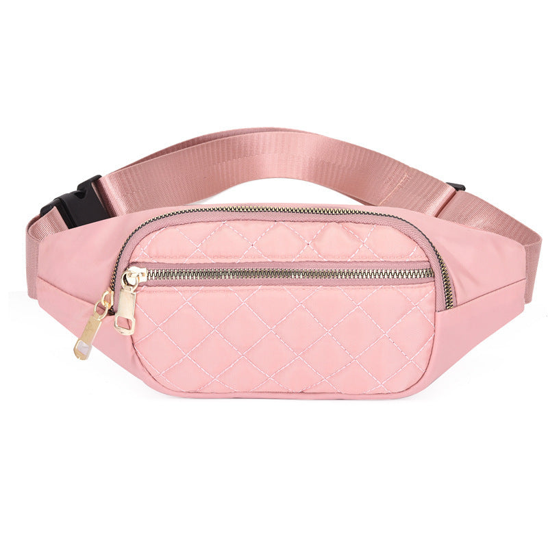 Trendy women’s nylon fanny pack with multiple pockets. Lightweight, durable crossbody waist bag perfect for running, hiking, cycling, and travel.