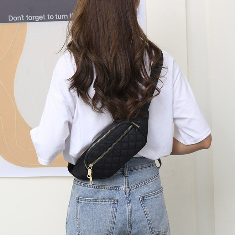Trendy women’s nylon fanny pack with multiple pockets. Lightweight, durable crossbody waist bag perfect for running, hiking, cycling, and travel.