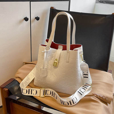 Letter Embossed Solid Color Retro Classic One-Shoulder Portable Commuter Bucket Bag - grabzbags.com