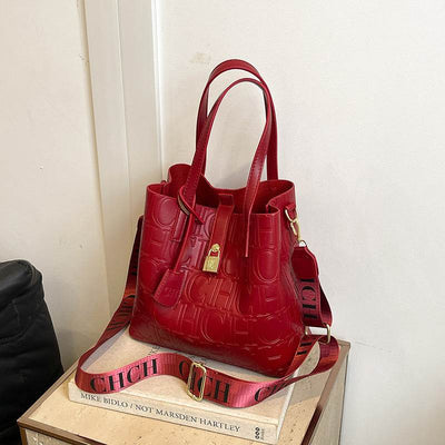 Letter Embossed Solid Color Retro Classic One-Shoulder Portable Commuter Bucket Bag - grabzbags.com