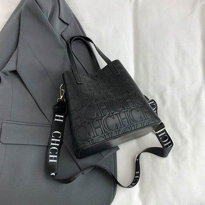 Letter Embossed Solid Color Retro Classic One-Shoulder Portable Commuter Bucket Bag - grabzbags.com