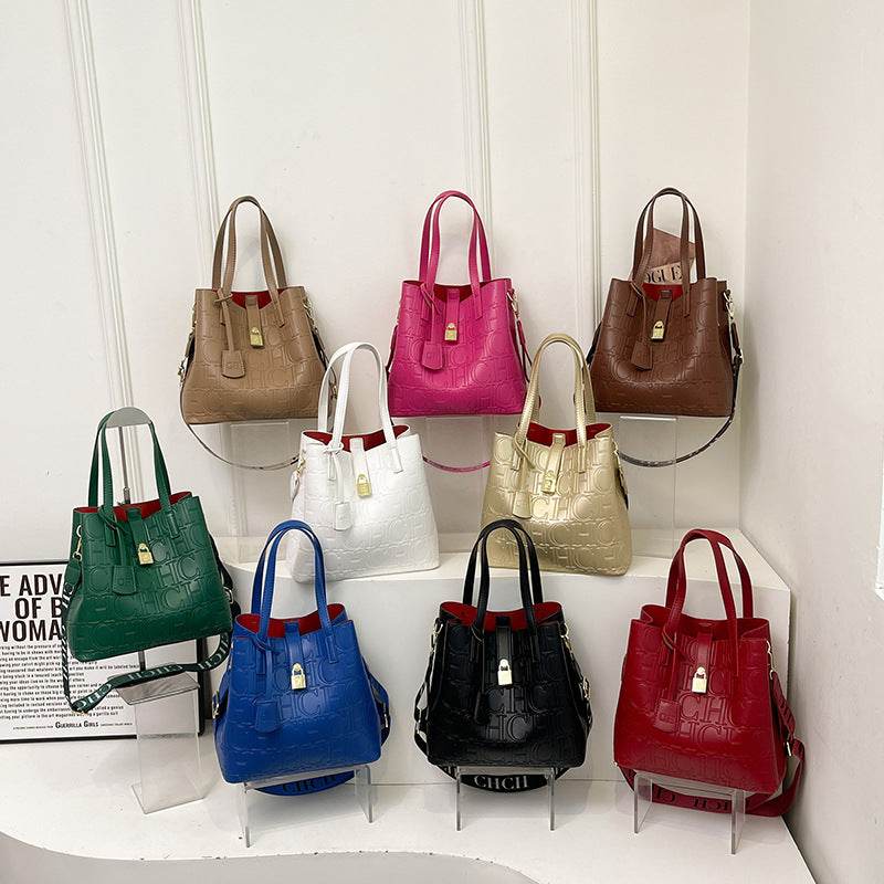 Letter Embossed Solid Color Retro Classic One-Shoulder Portable Commuter Bucket Bag - grabzbags.com
